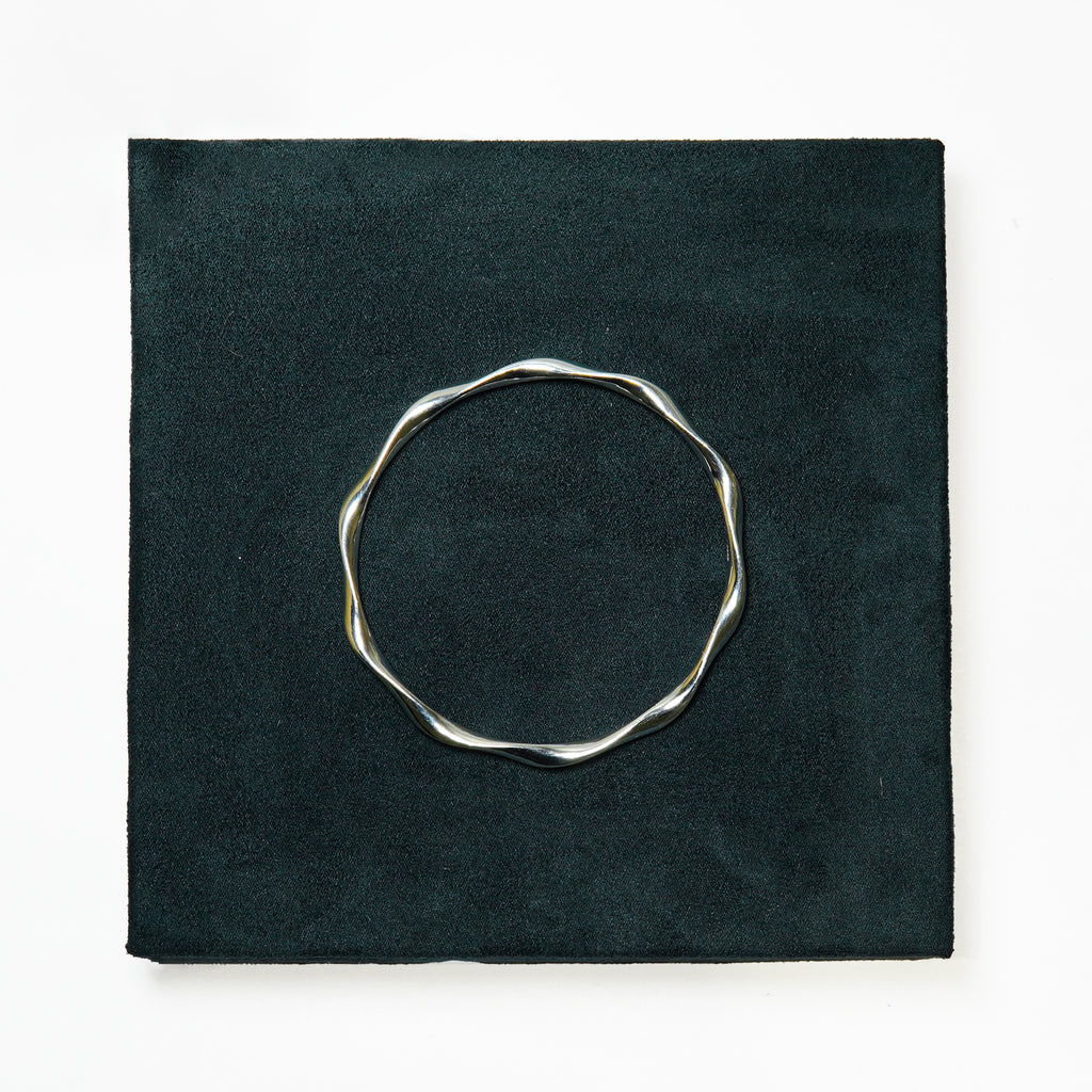 The Liquid Silver Wave Bangle