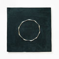 The Liquid Silver Wave Bangle