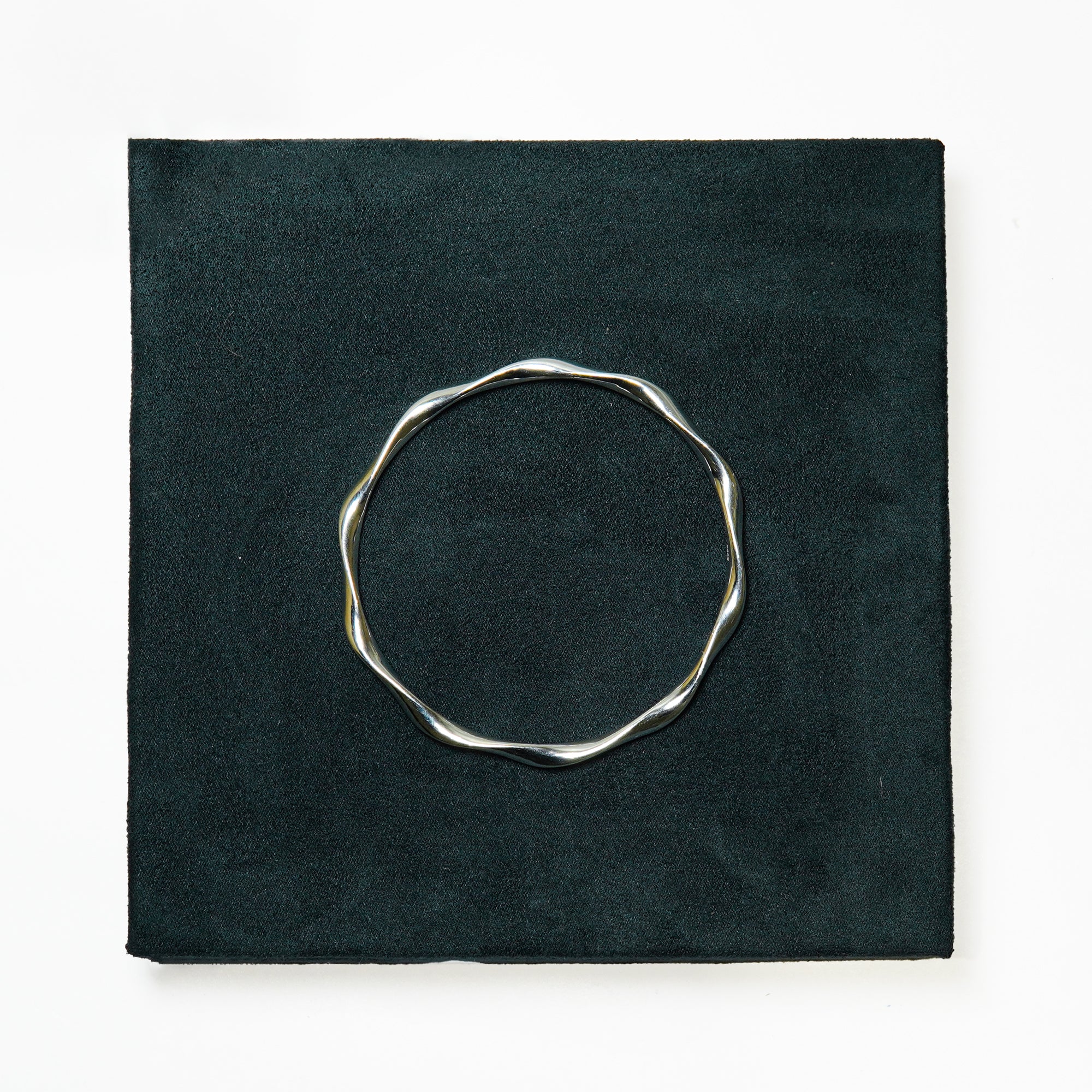 The Liquid Silver Wave Bangle