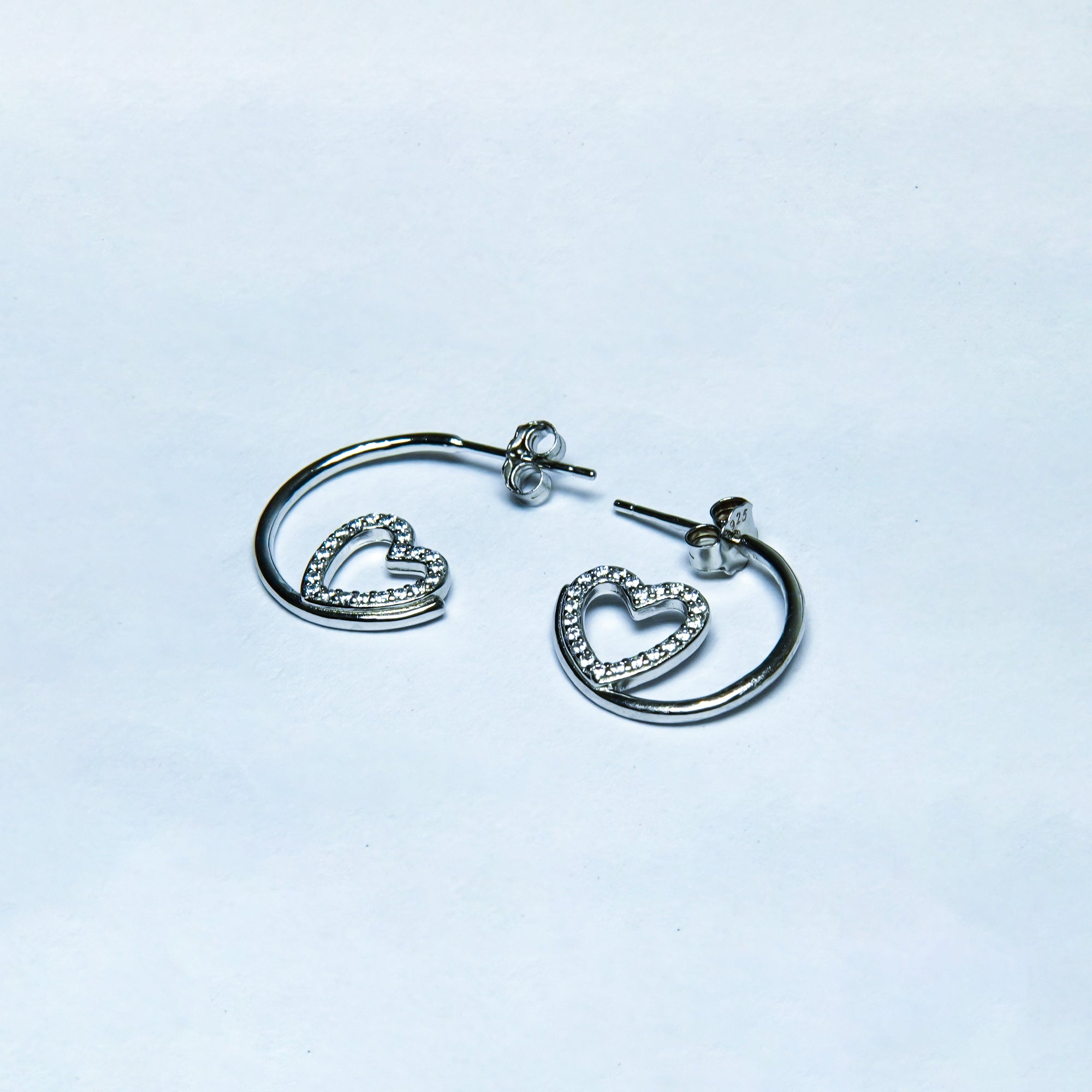 Radiant Heart Spiral Dangle Silver Earrings